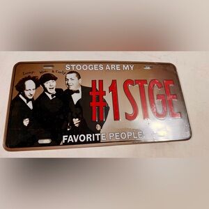 Stooges Themed Decorative Plaque with Red and Brown Accents
